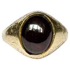 Anello con granato cabochon e oro 9 carati d'annata