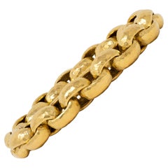 Tiffany & Co. Paloma Picasso, 1989, Vintage-Armband aus 18-karätigem Gold mit gehämmerten Rollo-Gliedern
