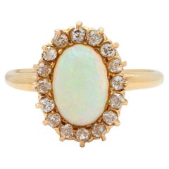 Edwardian Opal Diamond 14 Karat Yellow Gold Antique Halo Ring