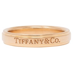 Tiffany & Co. 1990's 18 Karat Yellow Gold Vintage Logo Wedding Band Ring