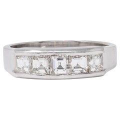 Contemporary 1.03 CTW Square Step Cut Diamond Platinum Channel Band Ring
