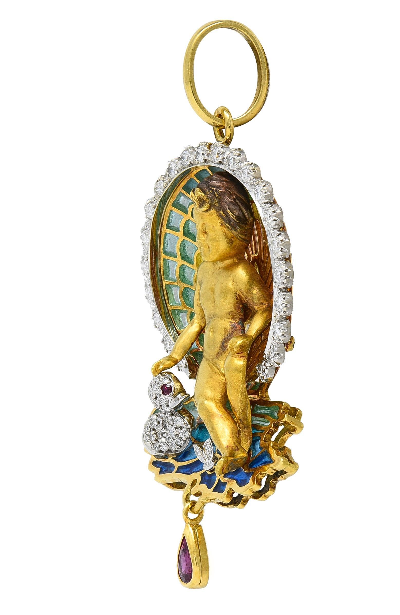 Designed to depict a yellow gold putto cherub seated in a half shell floated in a pond
Accented by white gold scalloped shell edges with duck and foliates floating in pond
Bead and pavé set with round brilliant cut diamonds throughout
Weighing 1.18