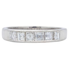 Contemporary 0.72 CTW Diamond Platinum Five Stone Channel Band Ring