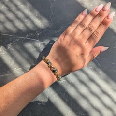 Bulgari Vintage-Armband „Doppio Cuore“ aus den 1980er Jahren, 18 Karat Gelbgold, Hämatit und Stahl
