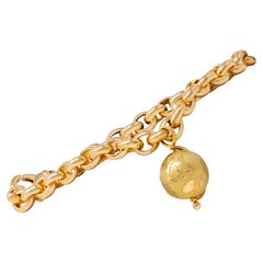 Van Cleef & Arpels French 1990's Globe Cable Link Charm Bracelet