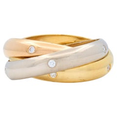 Cartier 1990's Diamond 18K Tri-Colored Gold Vintage Trinity Rolling Band Ring