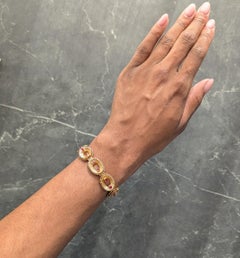 Van Cleef & Arpels: Französisches Vintage-Gliedarmband aus den 1950er Jahren mit Rubinen und 18 Karat Gelbgold
