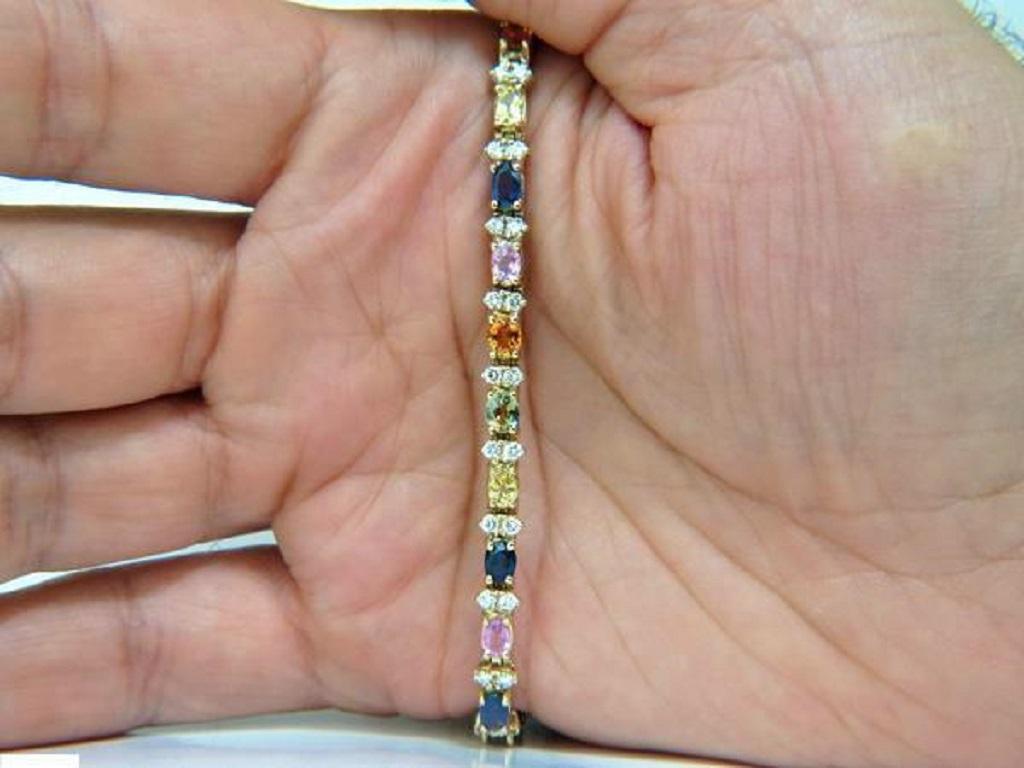 Stunning and Rare

Assorted Fine Gem Colors Of 6.50ct. sapphires

Blues, Orange, Yellows and pinks

Beautiful colors sparkles and diamonds dazzle

 

Diamonds: 1.30ct. 

G-H color, Vs-2 clarity.

14kt. yellow gold

Bracelet measures 7 inches.

Free