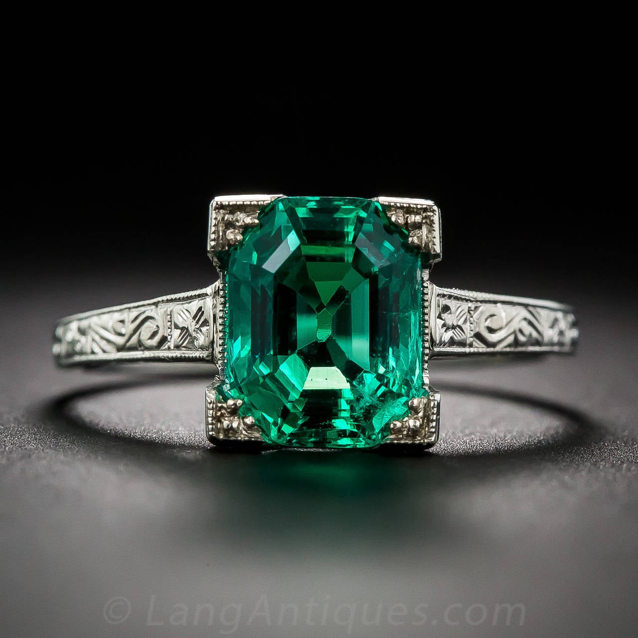 Only a precious few (almost none!), gem-quality, Colombian emeralds from the old Muzo mine are free of any treatments (including customary oil) whatsoever, and this ultra-rare and radiant, electric-green gem is a spectacular and shining example.