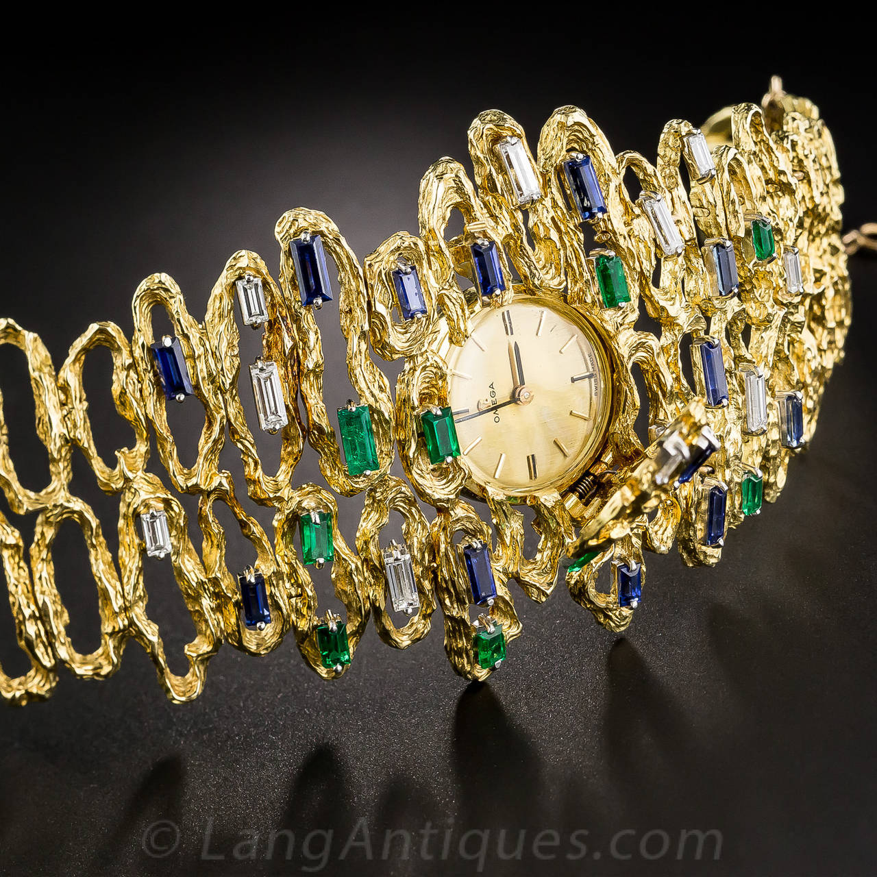 Omega Yellow Gold Gem Set Free Form Bracelet Wristwatch circa 1960s In Excellent Condition In San Francisco, CA