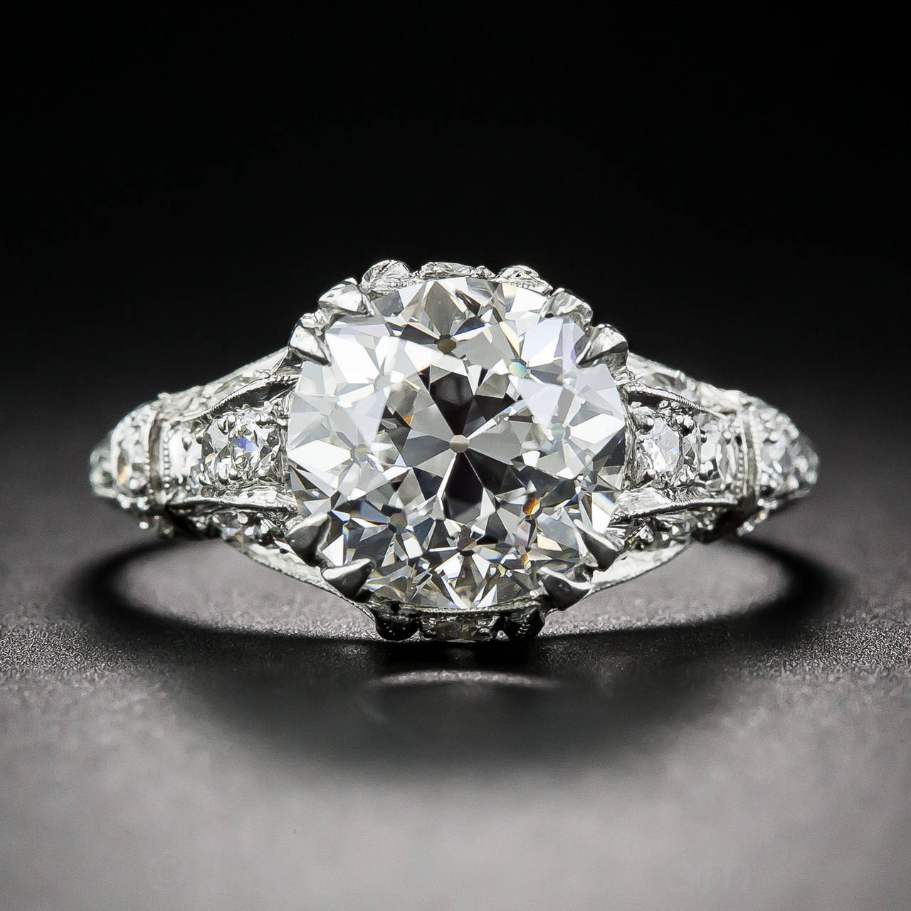 A high-color, high-clarity, high-voltage, original late-Edwardian/early-Art Deco engagement ring - circa 1920 - featuring a spectacular European-cut diamond, weighing 3.14 carats, accompanied with a GIA Diamond Grading Report stating: G color - VVS1