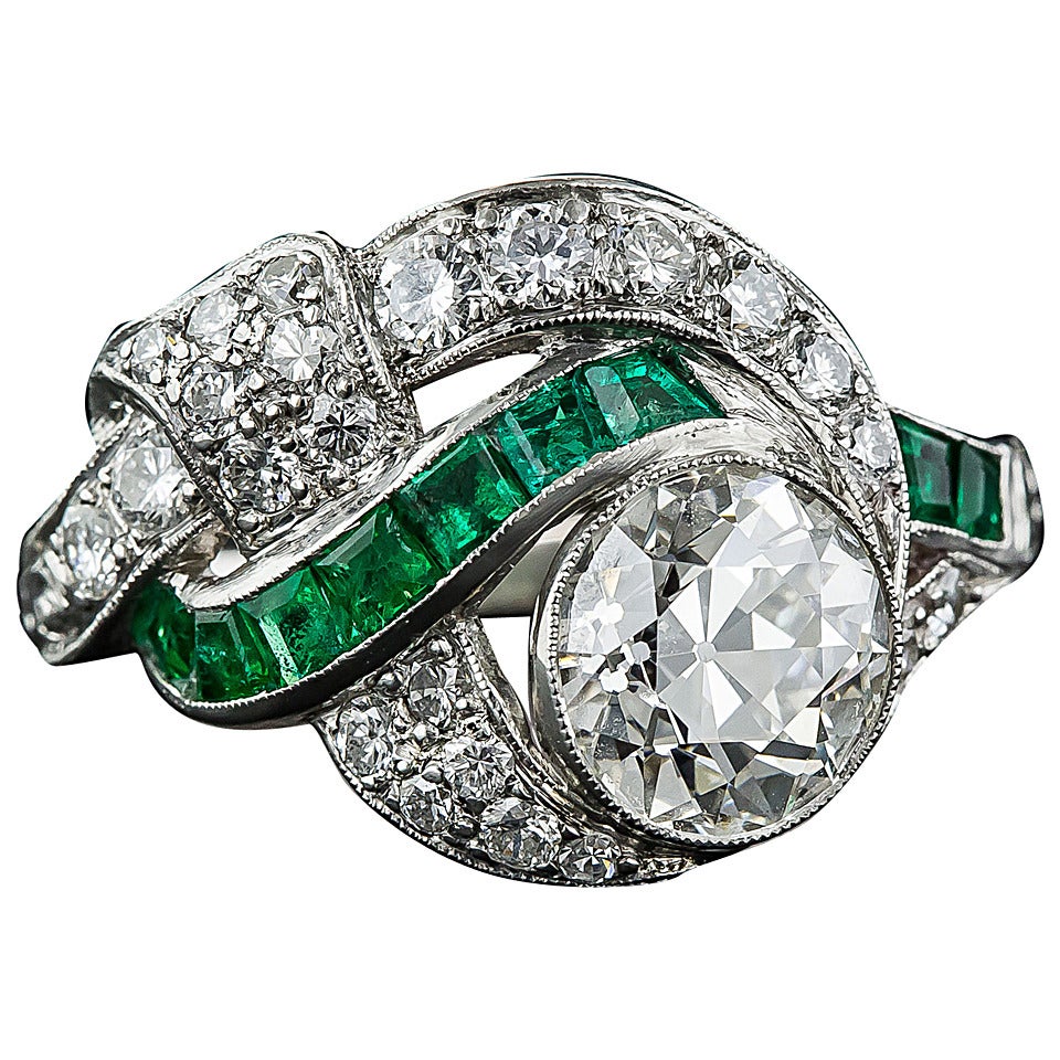 Art Deco 1.97 Carat Center Diamond and Emerald Ring For Sale