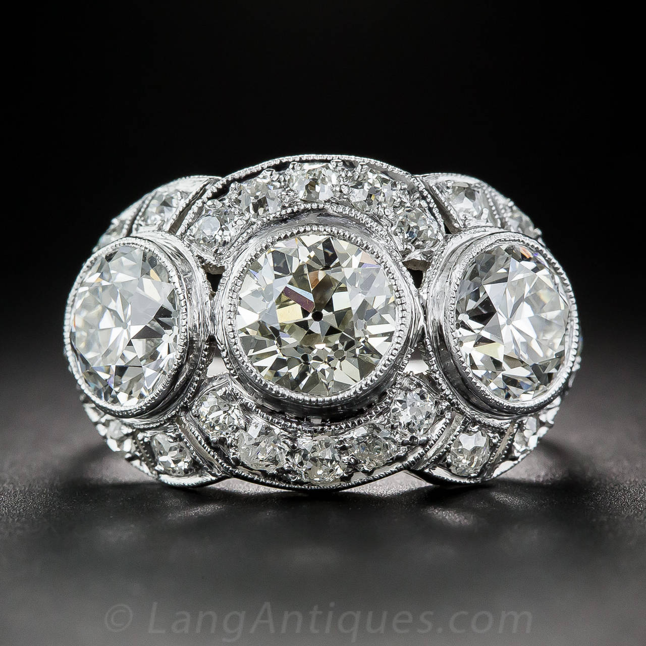 art deco three stone diamond ring