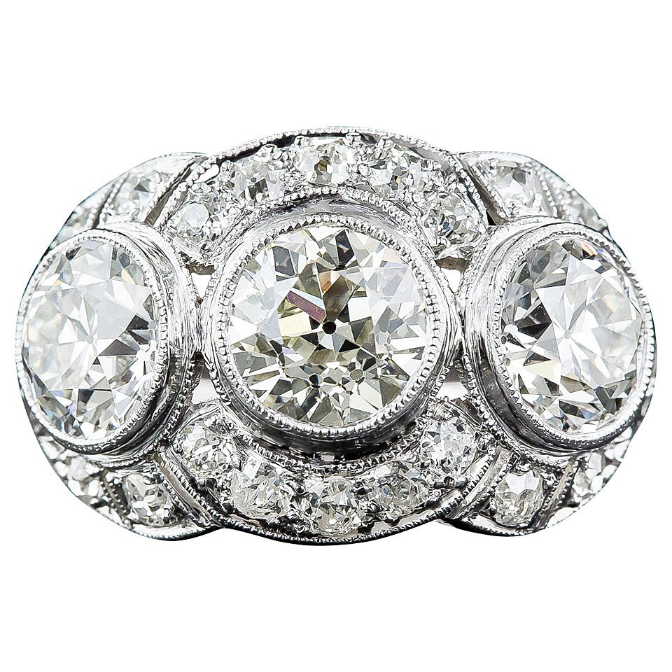 Art Deco 3.65 Carat Diamond Platinum Three-Stone Ring For Sale