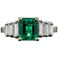 1.50 Carat Emerald and Diamond Ring