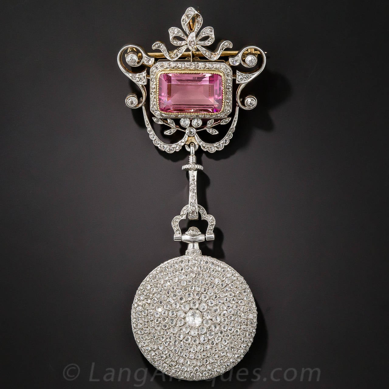 A beautiful marriage was made between this truly magnifique, 1920s Cartier diamond pendant watch and a very complimentary and colorful Edwardian watch pin. The watch itself is, in a word, 'amazing'! About 600 bright-white and sparkling rose-cut