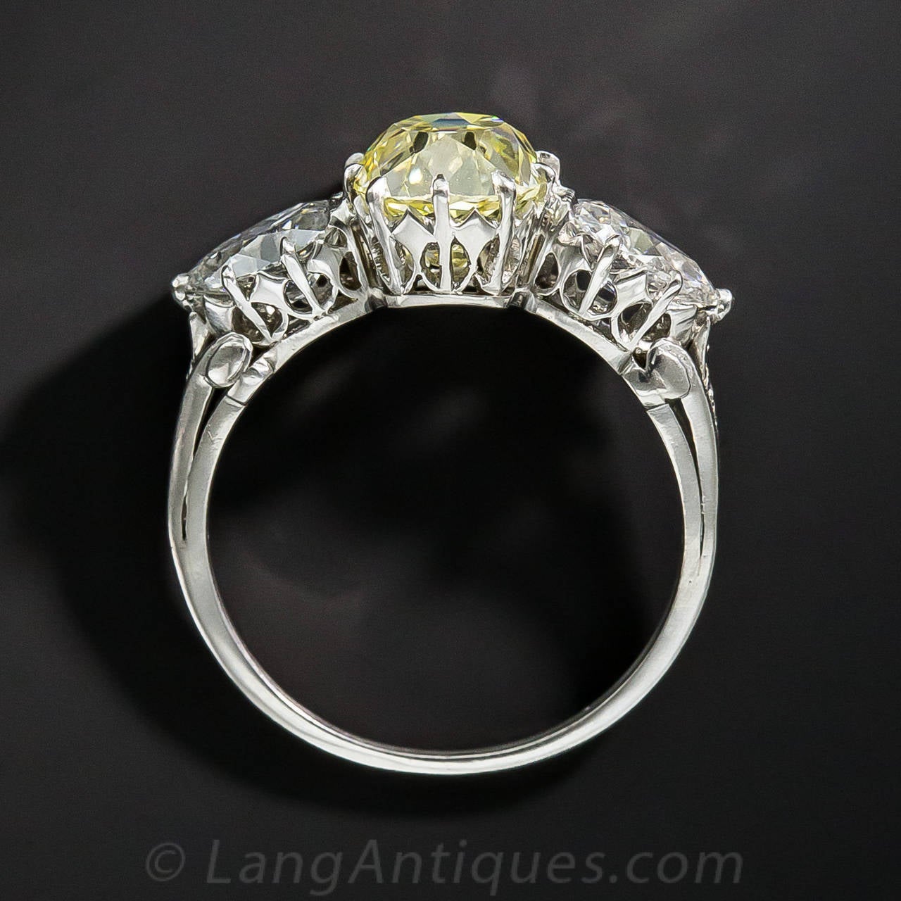 Edwardian 1.81 Carat Fancy Intense Yellow Diamond Platinum Three Stone Ring 2