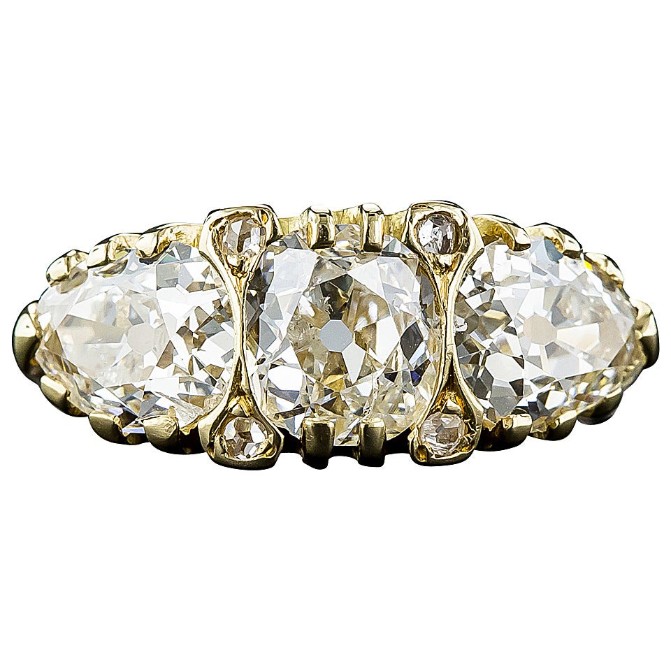 2.66 Carat English Three-Stone Diamond Gold Ring For Sale