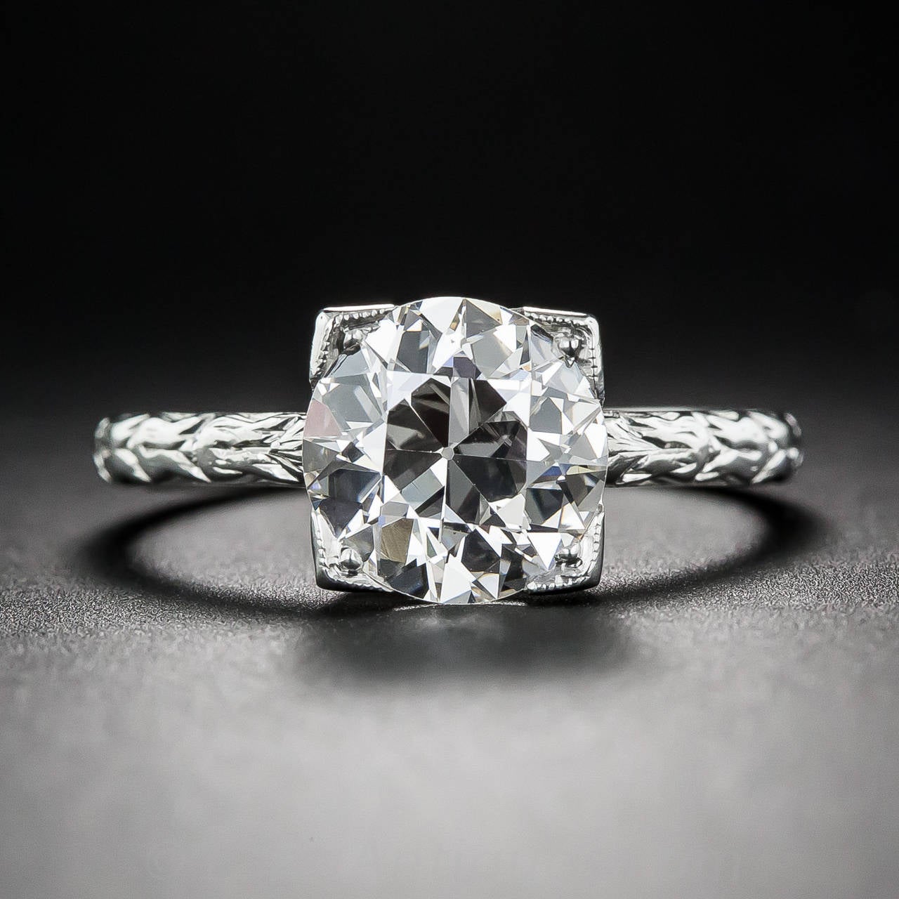 A simply gorgeous 2.07 carat European-cut diamond is the shining star of this early-20th century vintage diamond engagement ring by America’s most celebrated house of jewels - Tiffany & Company. The sparkling stone is classically presented in