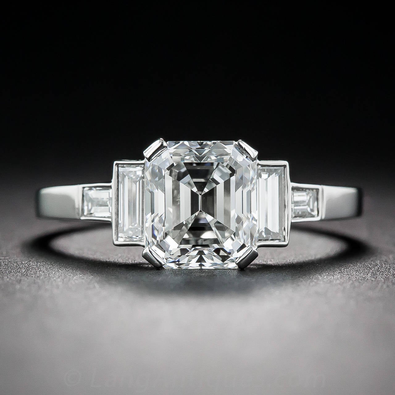 A gorgeous, classically modeled, high-color and clarity, vintage emerald-cut diamond, weighing 1.79 carat and accompanied by a GIA Diamond Grading Report stating: G color VVS1 clarity, beams brightly between two pairs of perpendicularly arrayed