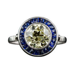 1.63 Carat Natural Fancy Yellow & Calibre Sapphire Ring