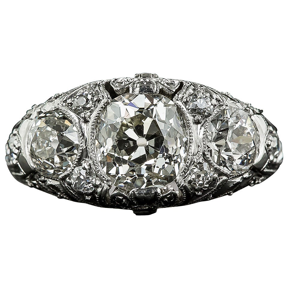 Early Art Deco Diamond Platinum Three-Stone Ring For Sale