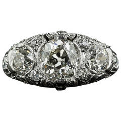 Early Art Deco Diamond Platinum Three-Stone Ring