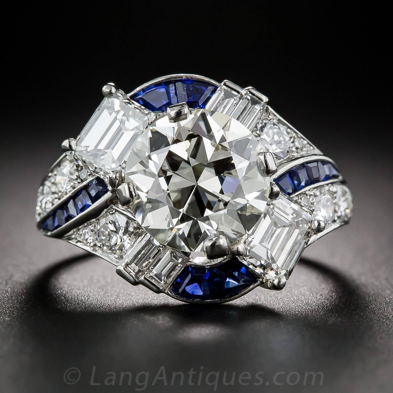 A singular and sensational sparkler from one of America's most celebrated jewelers - Raymond Yard. A high-caliber, transitional round brilliant-cut diamond, weighing 3.08 carats, explodes in the center of an astonishingly beautiful platinum, diamond