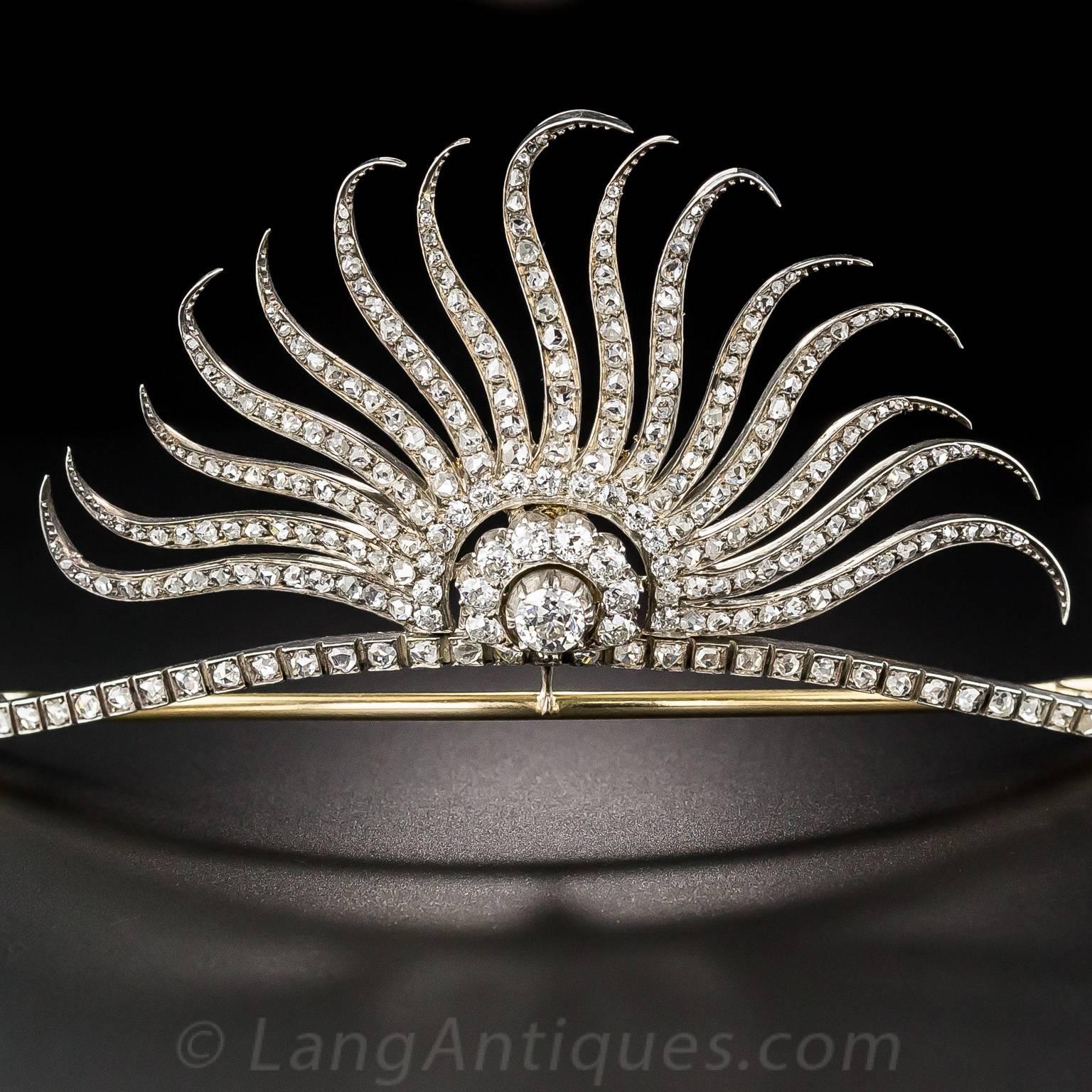Exotic, singular and stunning. This exquisite and extraordinary tiara, superbly designed and hand-crafted in silver over gold at the turn-of-the-20th-century, gleams with an artfully stylized sunrise composed of more than 250 rose-cut diamonds