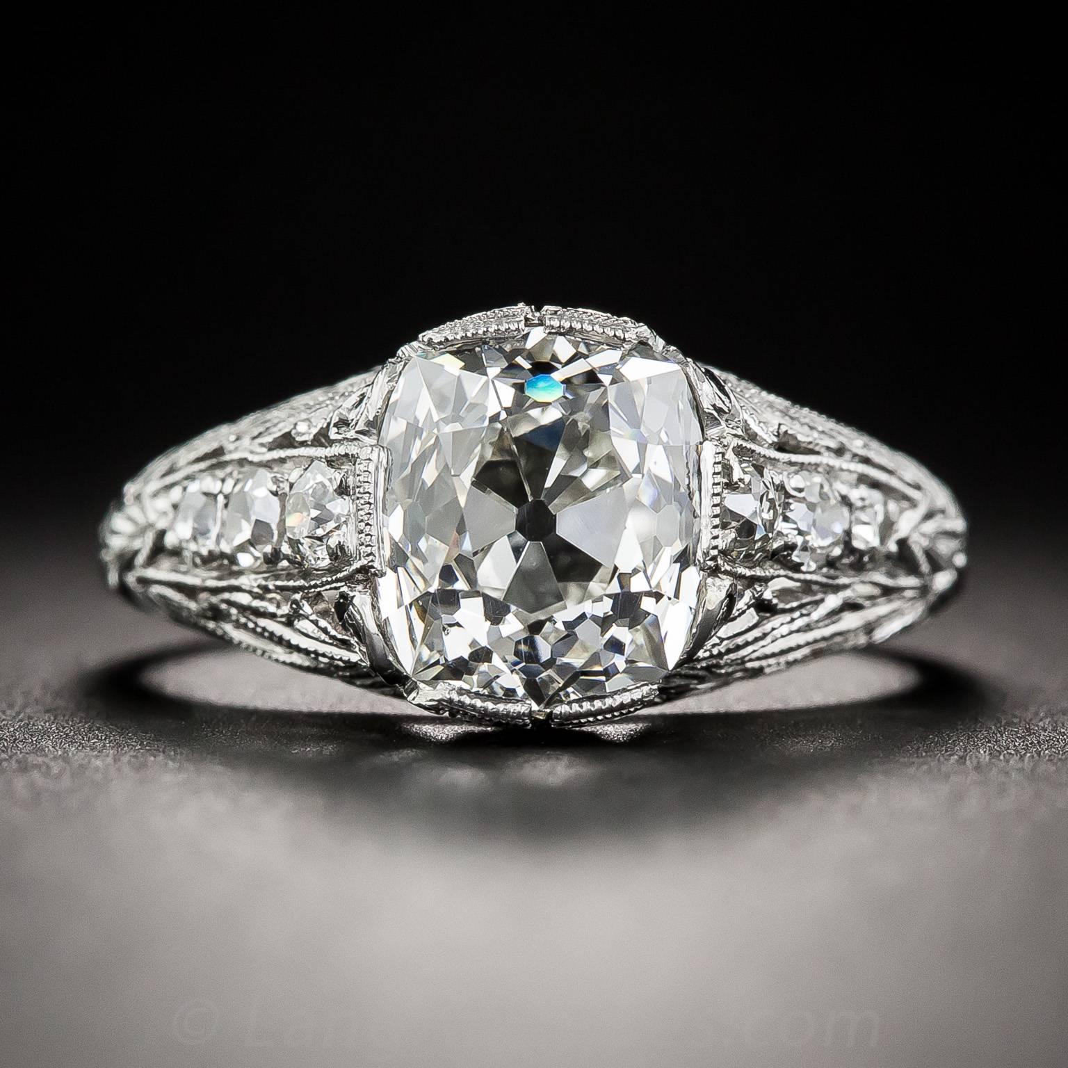 This seriously sparkling original Art Deco jewel, circa 1920s, sizzles front and center with a gorgeous, bright-white antique cushion-cut diamond, weighing 2.69 carats and accompanied with a GIA Diamond Grading Report stating: I color - SI1 clarity.