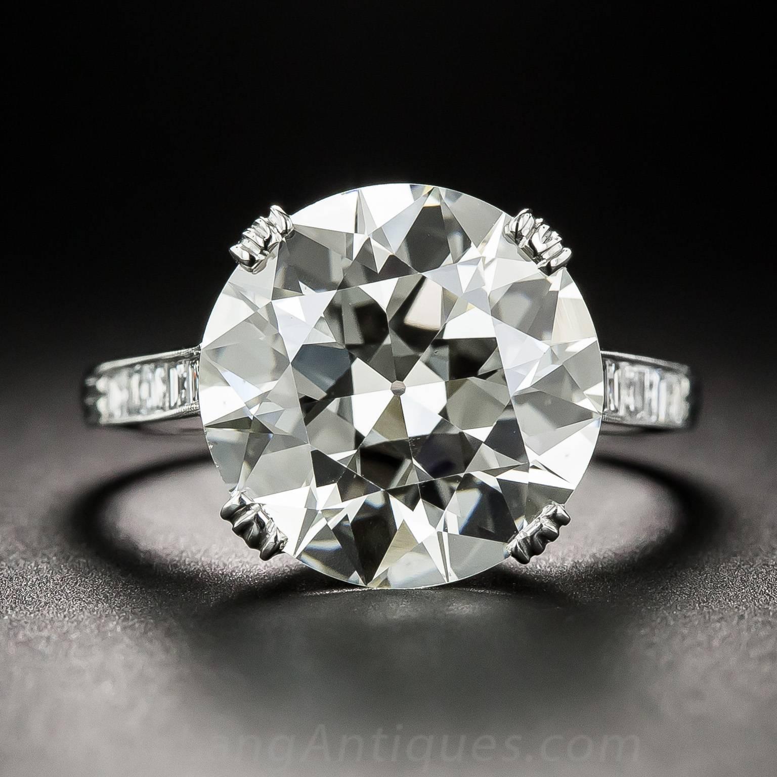Light up your life! This spectacular sizzler, dating from the 1920s-30s, stars an ultra-sparkling European-cut diamond weighing 6.78 carats. The big beautiful stone beams brilliantly and intensely from within an exquisitely understated mounting that