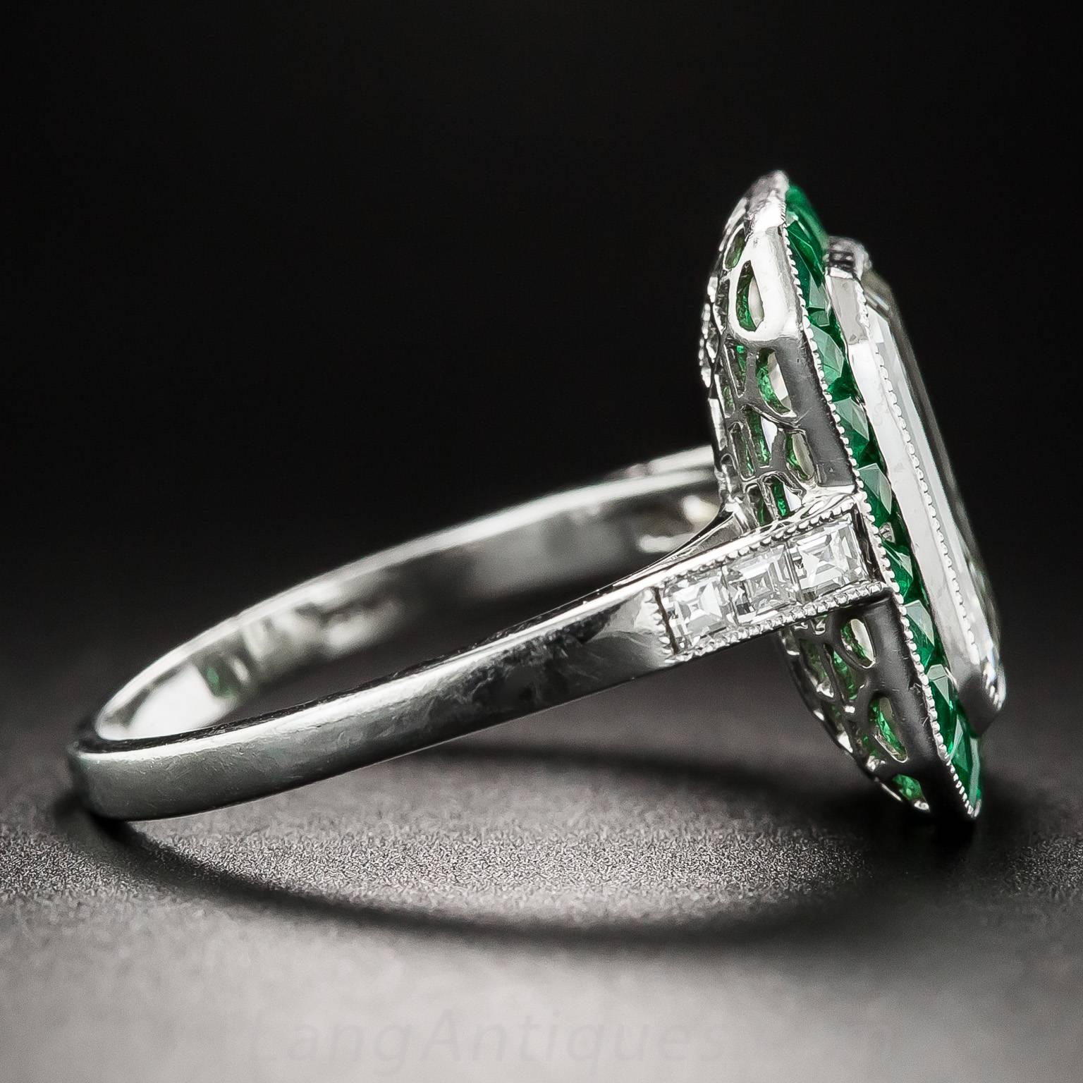 Art Deco 3.00 Carat Emerald-Cut Diamond Emerald Calibre Halo Ring For Sale