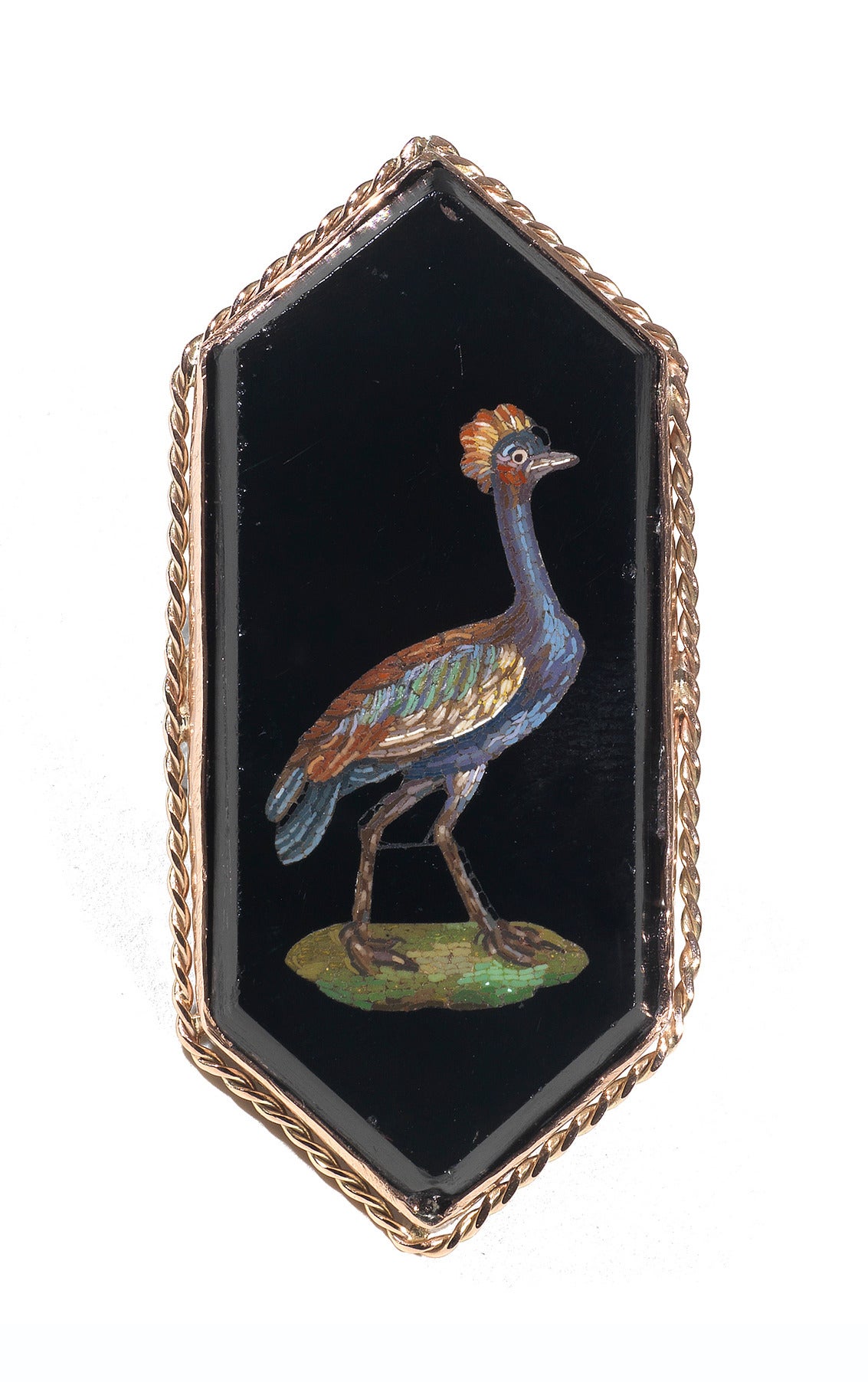 

The large unusual hexagonal cut mosaic plaque depicting a bird, on black ground within reeded bordered later rose gold mount

Finger size: 7   

Weight: 14.8 gr