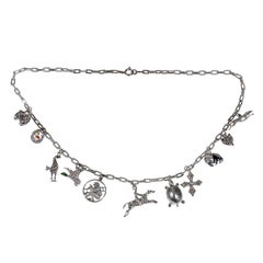 Enamel Diamond Platinum Charm Link Necklace, circa 1935