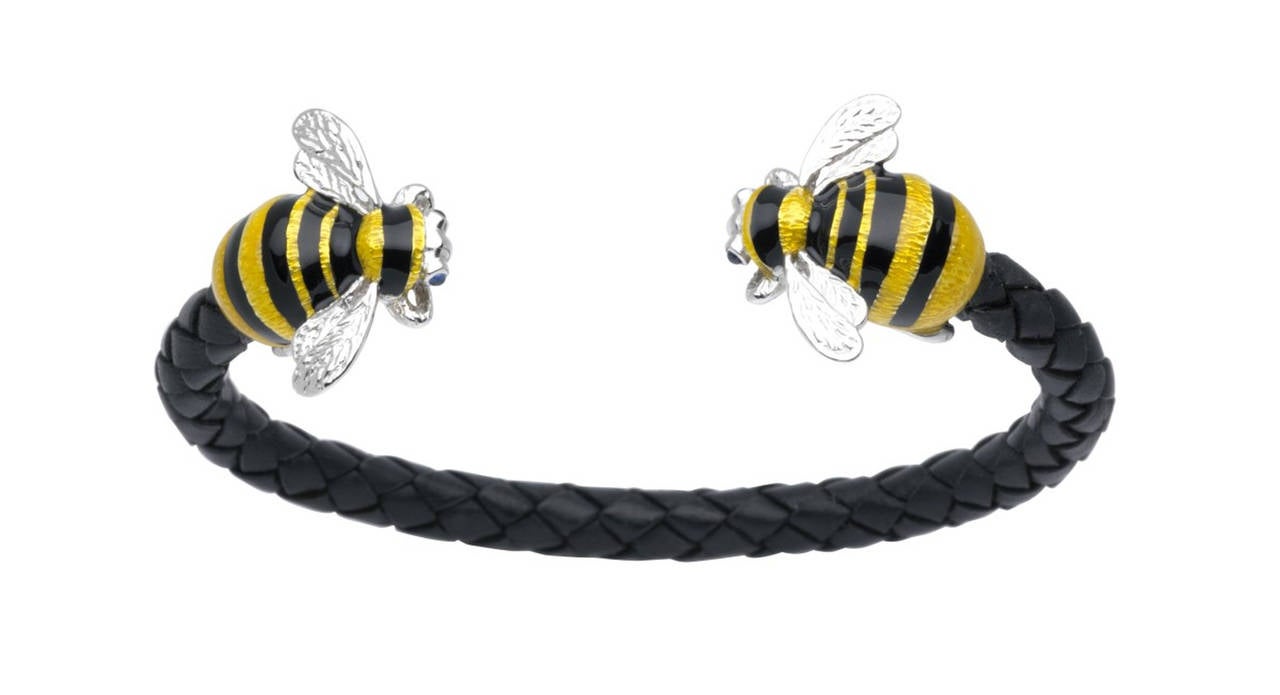 Bees buzzing in the garden, in the city, busy making honey, busy making money. Our busy bee bangle is the perfect accessory with a slick navy suit. Show your stripes and sport a sign of industrious heritage.

The Deakin & Francis Leather Bumble