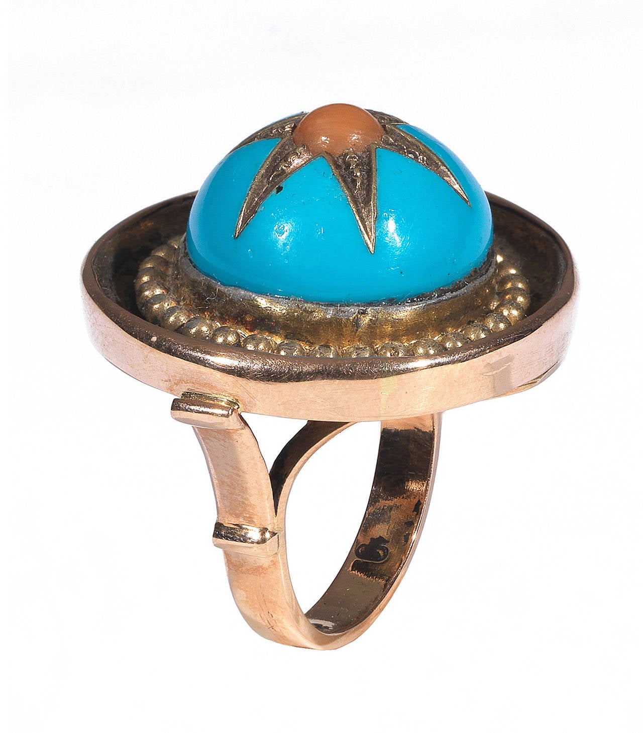 

Designed around central boss, decorated with light blue enamel centered by a star with a cabochon coral.

Weight: 11 gr

Size: 6.5