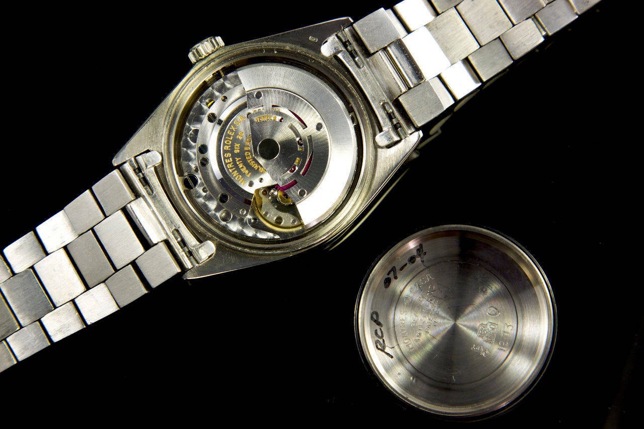 Rolex 18k white gold Day-Date automatic wristwatch with sweep center seconds, bracelet and rare large baton hands and hour markers. Ref. 1803, circa 1967. Cal. 1556 automatic movement, 26 jewels, brushed dial, applied baton indexes with luminous