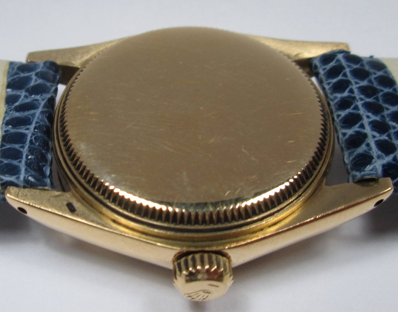 Oyster Perpetual, Ref. 6551, Case No. 1807534, circa 1968

26-jewel Cal. 1130 movement, silvered dial with applied baton and luminous dot indexes, gold hands with luminous inserts, within a screw back case with fluted bezel and screw down crown,