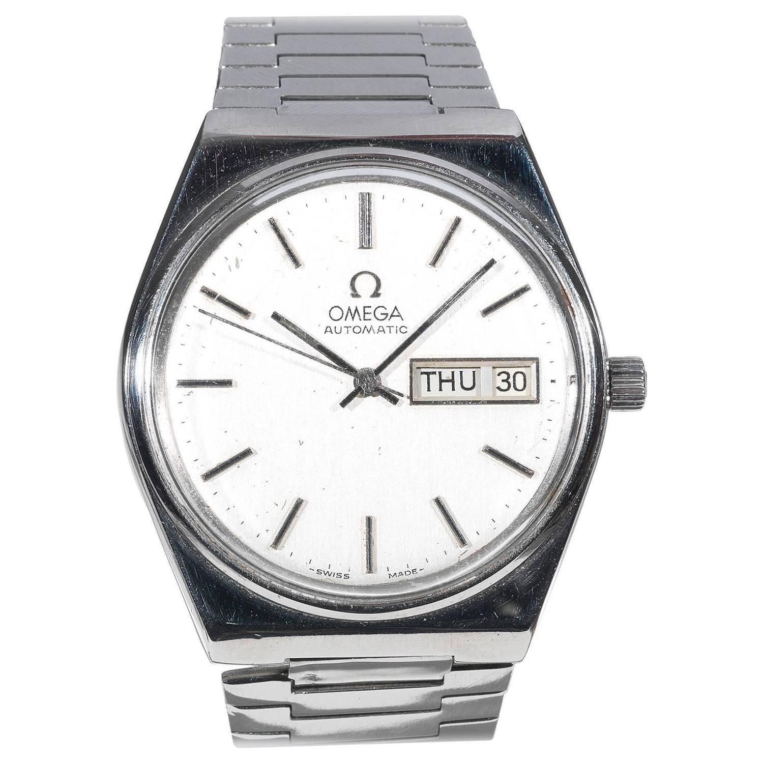 PLEASE NOTE: OUR PRICE IS FULLY INCLUSIVE OF SHIPPING, IMPORTATION TAXES & DUTIES

Ref. 166.0215 1. case No. 3660847. Made in the 1970's. 

Fine, tonneau-shaped, water-resistant, center seconds, self-winding, stainless steel wristwatch with