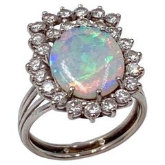 18 Karat White Gold Opal and Cluster Diamond Ring