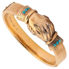 Bracelet à poignées en forme de fermoir en or, émeraudes et diamants, milieu du XIXe siècle