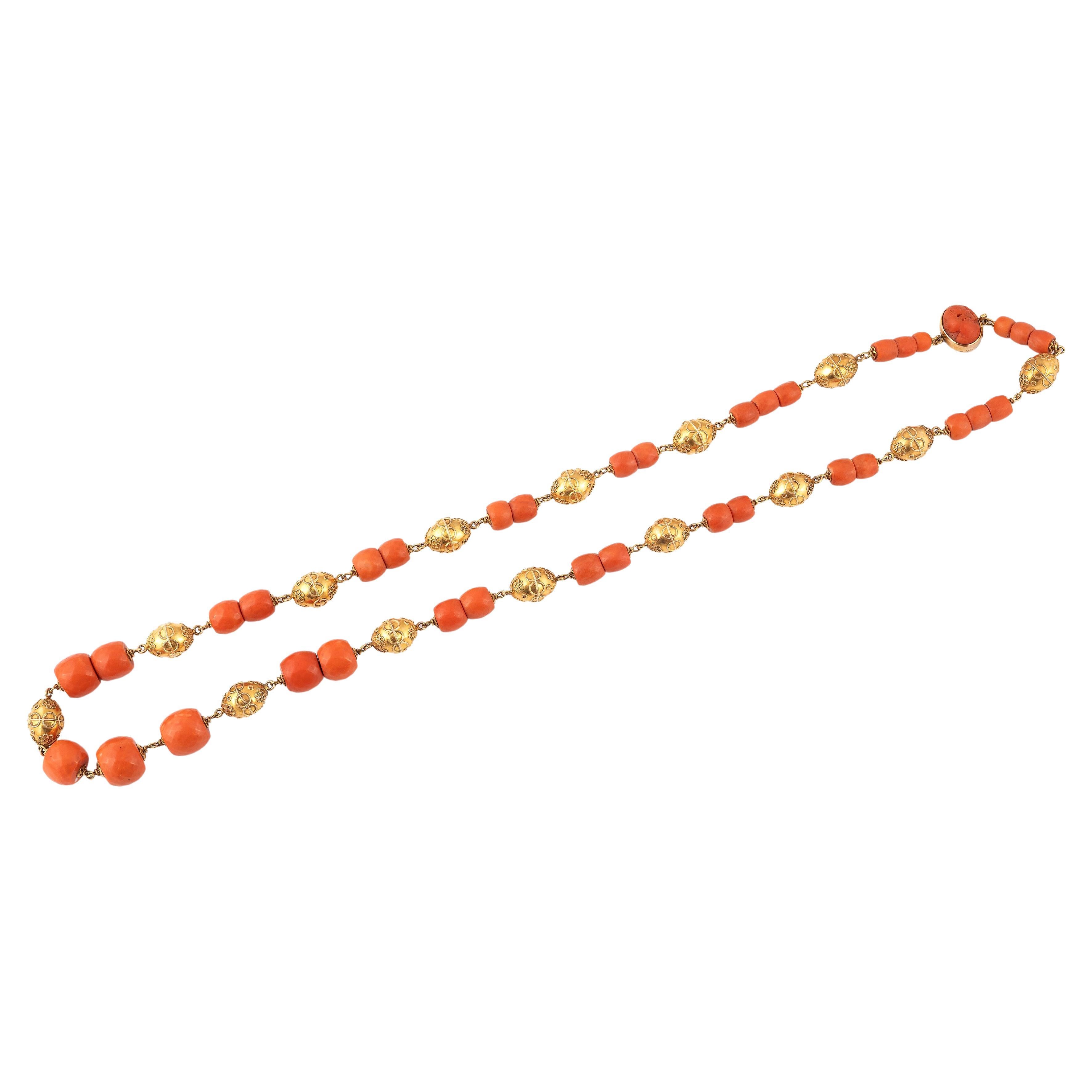 
Composed of seventy-five coral beads, measuring approximately 11.9 to 4.6mm, interspersed with archeological style  gold spheres
Length: 82cm
Weight: 135gr.