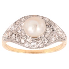 Anello con perle naturali e diamanti
