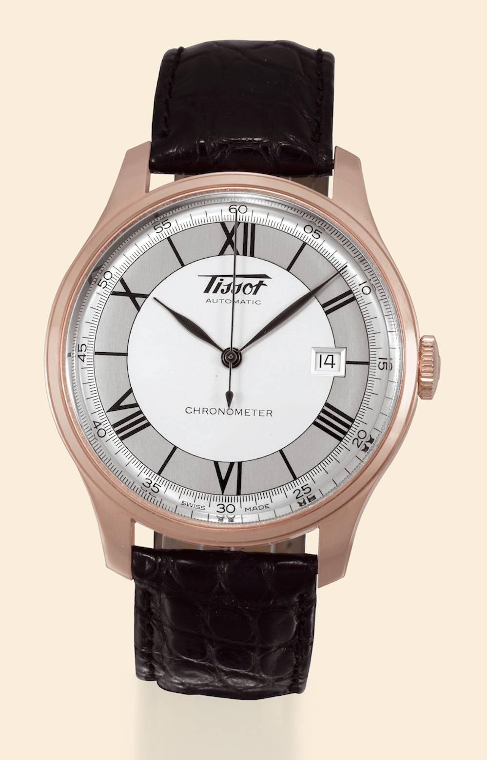

Case No. 0052, Ref H700333. Made circa 2000. Fine, water-resistant, self-winding, 18K pink gold wristwatch with date and 18K pink gold Tissot double deployant clasp.

Case two-body, polished and brushed, domed bezel, transparent case back, curved