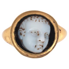 A Roman Gold Ring With A Three Quarters Portrait Of A Child 1st/2nd Century AD