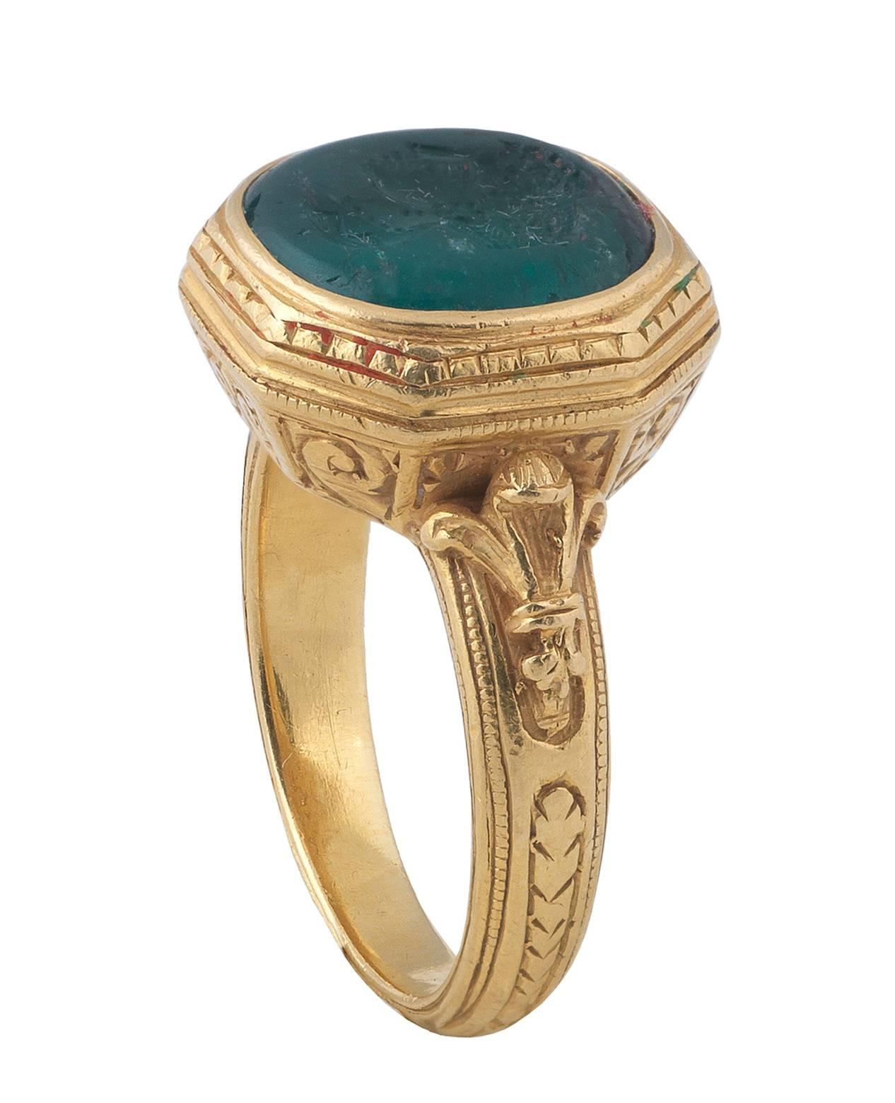 

The early 17th century South-American round shape emerald carved to depict Faustina Minor (the Younger), wife of the Roman Emperor Marco Aurelio and mother of his successor Commodo facing left with her traditional dress and hairstyle. 

The
