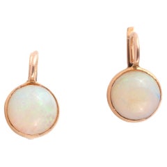 Paire de boucles d'oreilles en opale et or jaune 18 carats