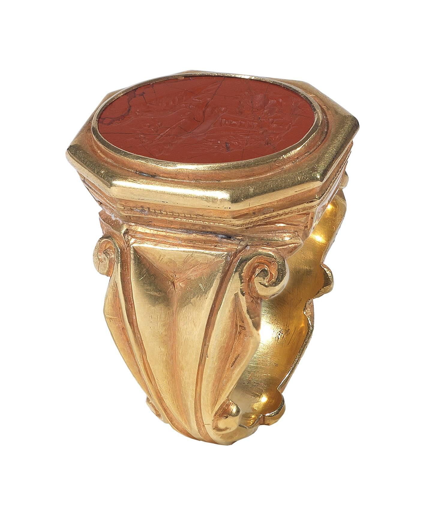 BERNARDO ANTICHITÀ PONTE VECCHIO FLORENCE

The 3rd century oval red jasper depicting the head of Fortuna, a corn ear and a bird on a cup, all classic depictions to symbolize fertility, luck and prosperity. 

These kind of rings was very popular in
