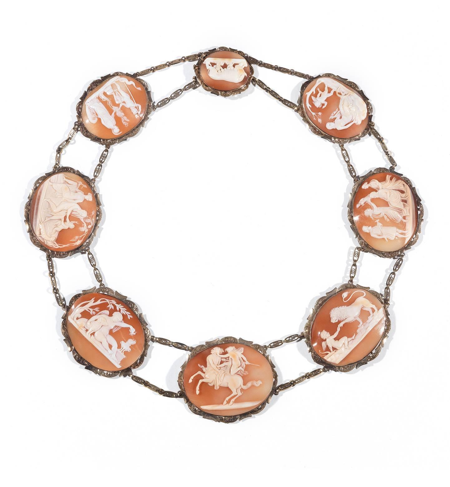 
BERNARDO ANTICHITÀ Ponte Vecchio Florence 

The necklace composed of eight shell cameos each carved to depict a classical scene, taken from works of Classic antiquities and Antonio Canova, including 'The Education of Bacchus', 'The Birth of