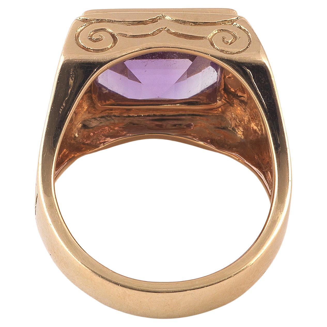 
Square cut amethyst mounted 18kt gold and the shank engraved with religious symbols

Size 10

Weight: 22,3gr.